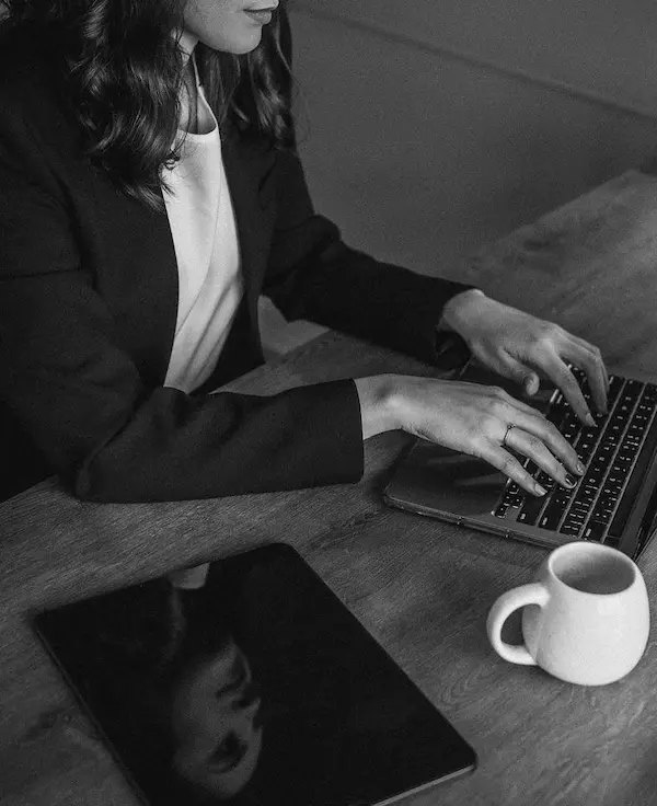 Digital Marketing Freelancer Malappuram working on laptop with coffee at desk